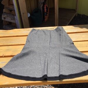 Charcoal and black fit and flare skirt.